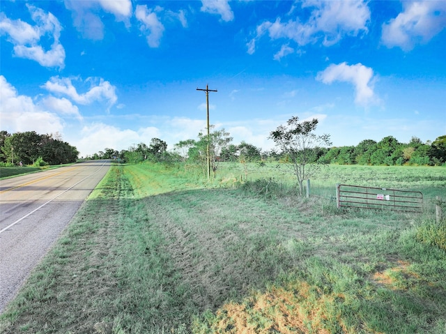 view of road with a rural view