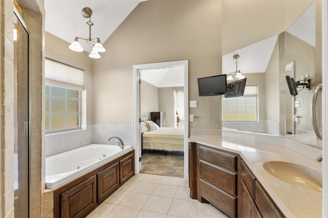 bathroom with separate shower and tub, tile patterned floors, vaulted ceiling, vanity, and a notable chandelier