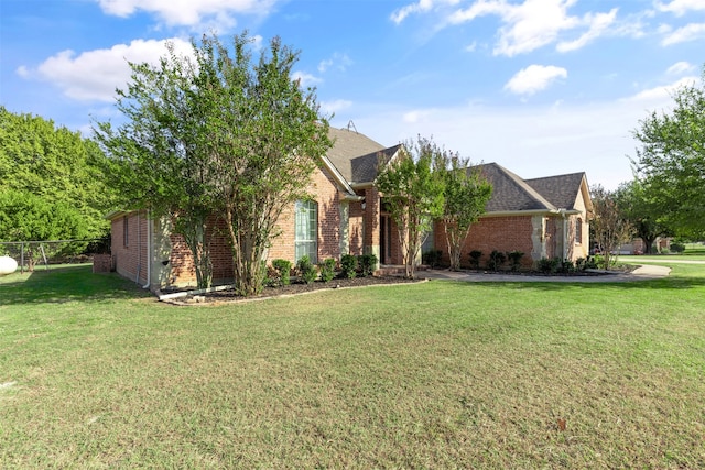 view of front of house with a front lawn