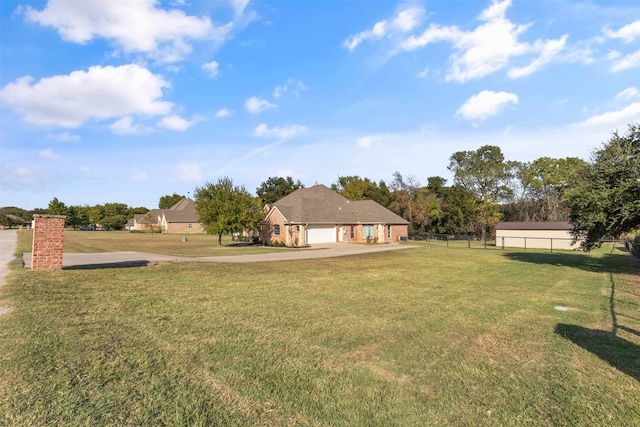 view of yard featuring a garage