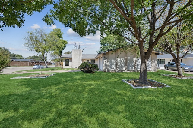 view of yard featuring a garage