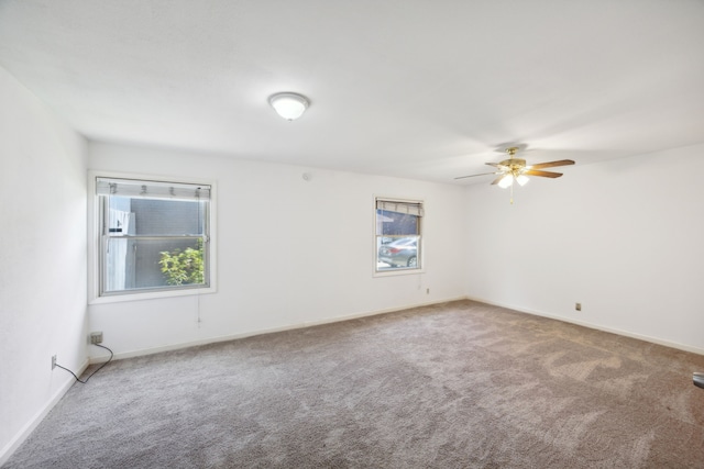 unfurnished room featuring carpet floors and ceiling fan