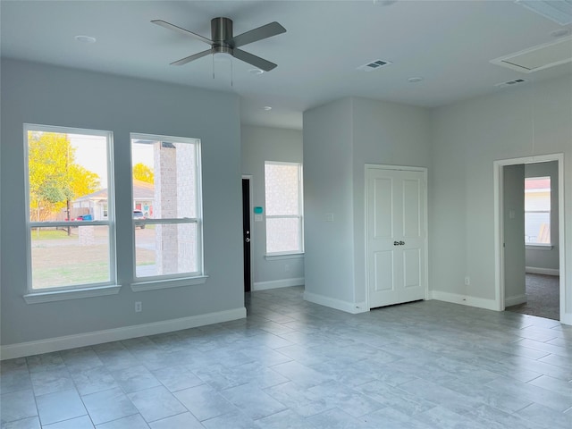 empty room featuring ceiling fan