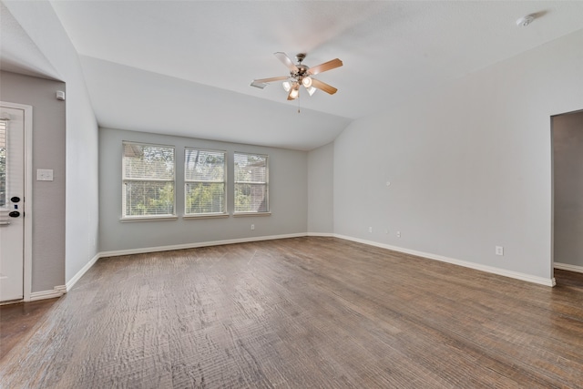 interior space featuring lofted ceiling and ceiling fan