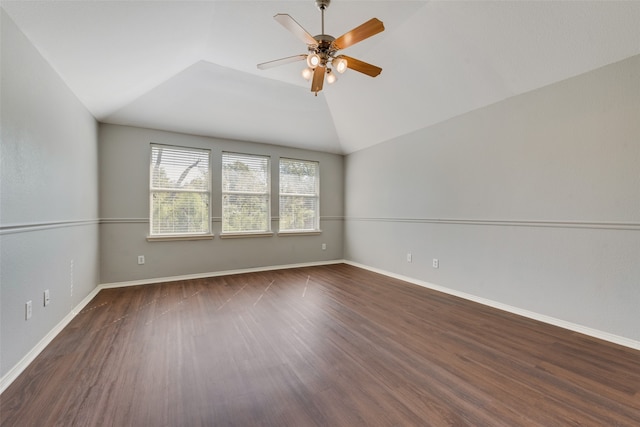 unfurnished room featuring ceiling fan, lofted ceiling, and dark hardwood / wood-style flooring