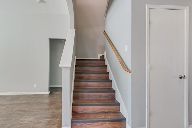 stairway with wood-type flooring