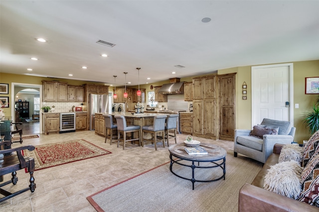 living room with beverage cooler