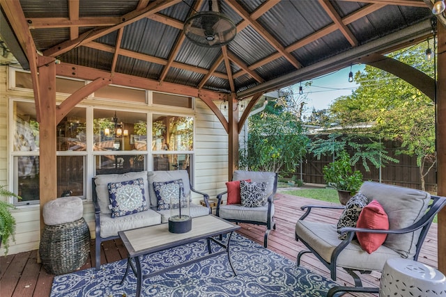 view of patio with a gazebo, outdoor lounge area, a deck, and ceiling fan