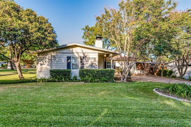 view of front of house with a front yard