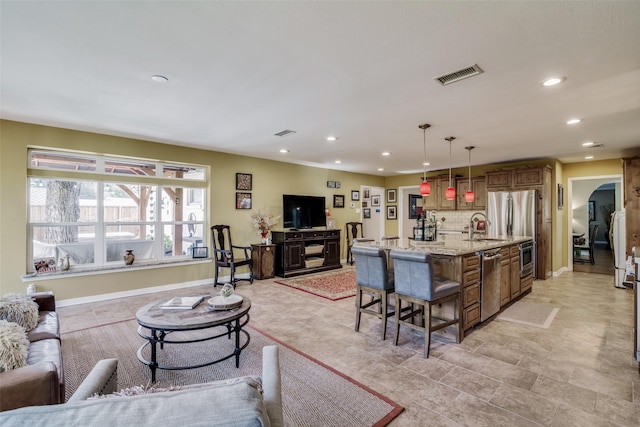 living room with sink