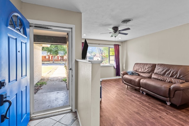 interior space featuring ceiling fan and hardwood / wood-style flooring