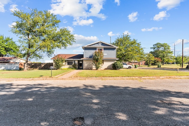 view of front facade with a front lawn