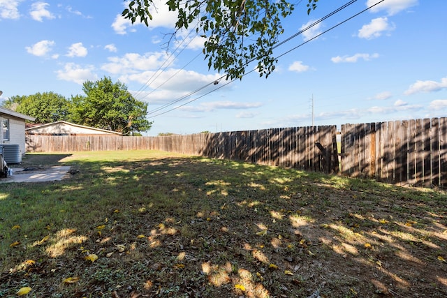 view of yard featuring central AC unit