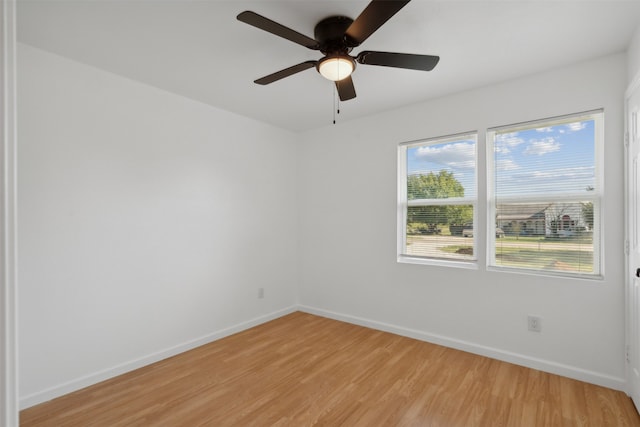 unfurnished room featuring ceiling fan and light hardwood / wood-style flooring