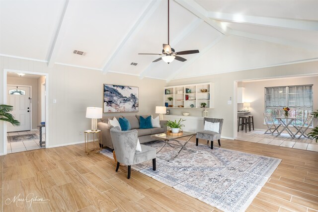 living room with vaulted ceiling with beams, wood-type flooring, and ceiling fan