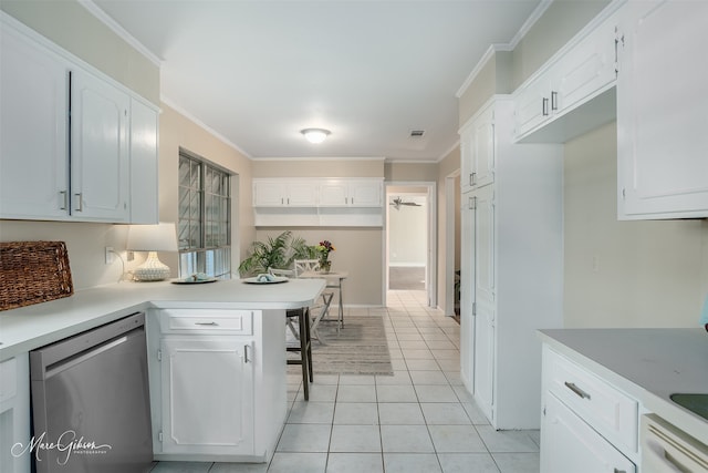 kitchen featuring dishwasher, white cabinetry, light tile patterned flooring, and crown molding