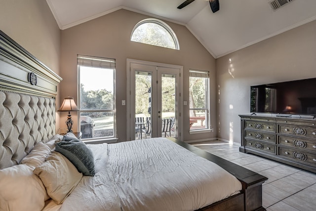 tiled bedroom with multiple windows, access to exterior, french doors, and ceiling fan