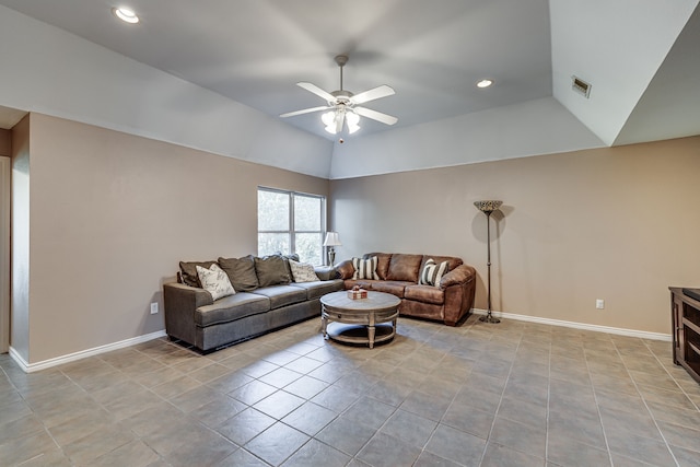 tiled living room featuring lofted ceiling and ceiling fan