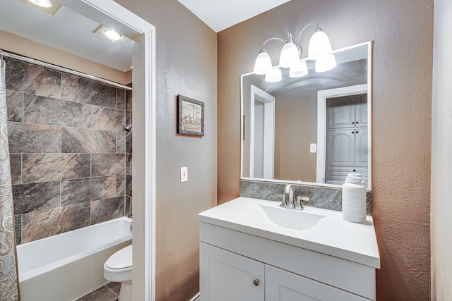 full bathroom featuring vanity, toilet, and shower / bath combination