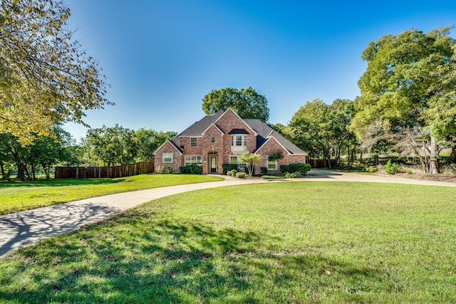 view of property with a front lawn