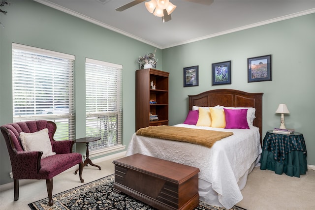 bedroom featuring ceiling fan, carpet flooring, and ornamental molding