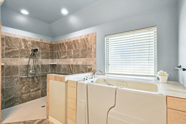 bathroom featuring plus walk in shower