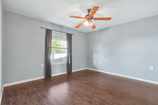 unfurnished room featuring dark hardwood / wood-style flooring and ceiling fan