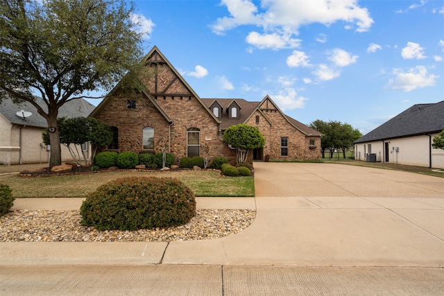 tudor house featuring central AC