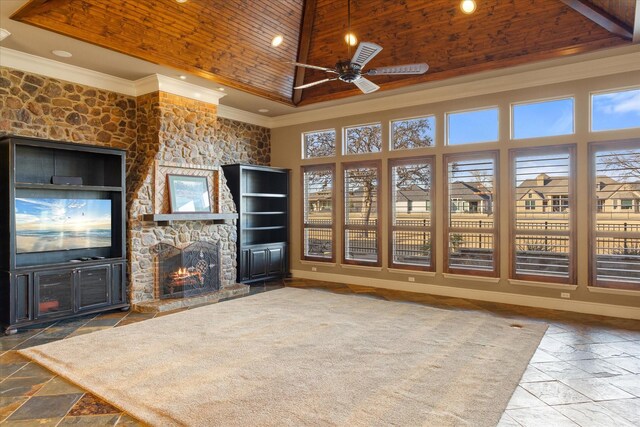 foyer entrance with wood-type flooring, ornamental molding, and ceiling fan