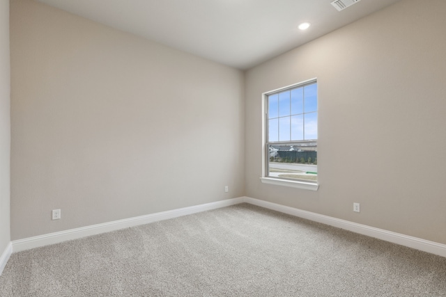 empty room featuring carpet flooring