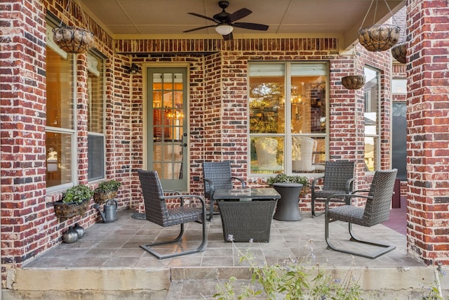 view of patio / terrace featuring ceiling fan