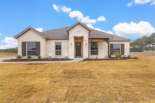 view of front of house with a front lawn