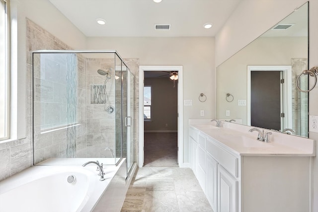 full bath featuring visible vents, a stall shower, a bath, a ceiling fan, and a sink