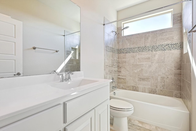 full bath featuring shower / bath combination, toilet, and vanity