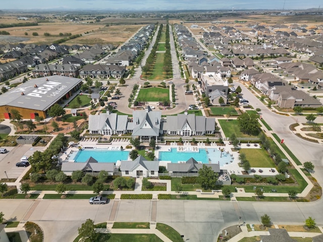 birds eye view of property with a residential view