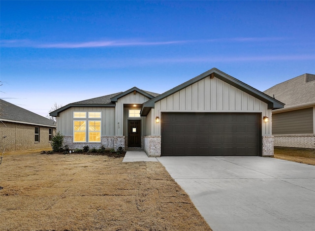 view of front of property with a garage