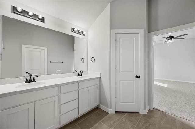 bathroom featuring ceiling fan, tile patterned flooring, and vanity