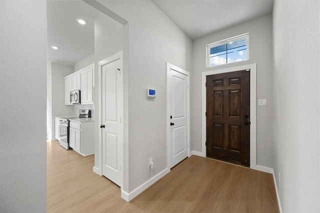 foyer entrance featuring light hardwood / wood-style flooring