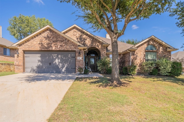 ranch-style house with a front lawn and a garage