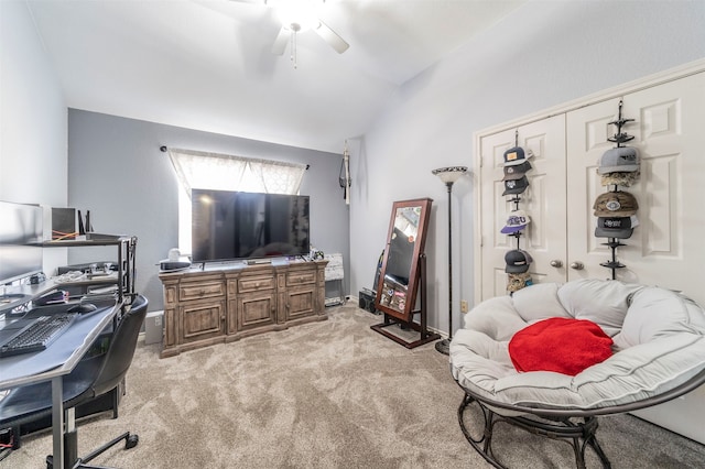 carpeted office with ceiling fan and lofted ceiling