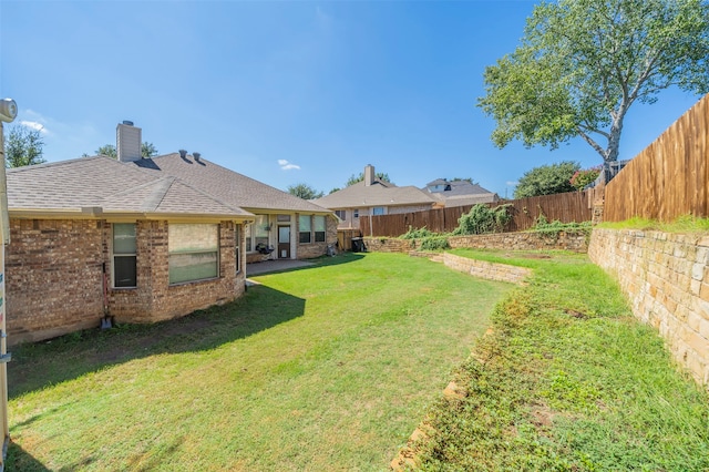 view of yard featuring a patio