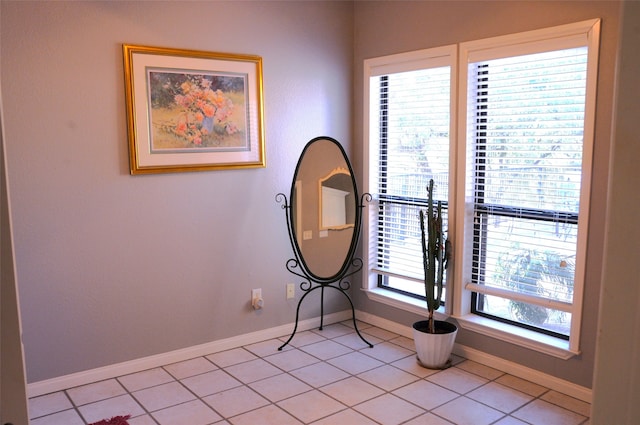 sitting room featuring light tile patterned flooring