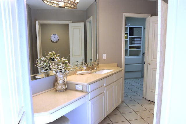 bathroom with vanity and tile patterned flooring