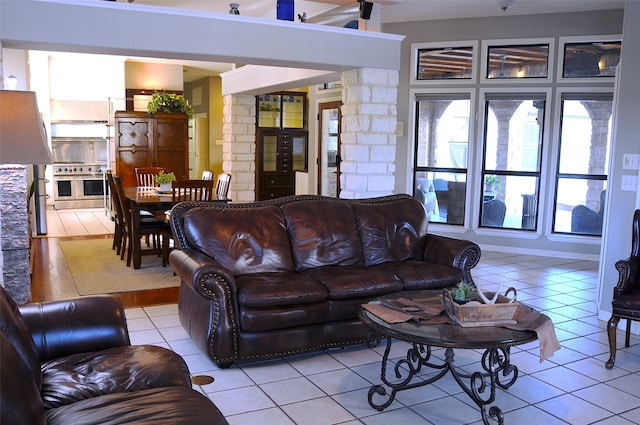 living room with light tile patterned floors