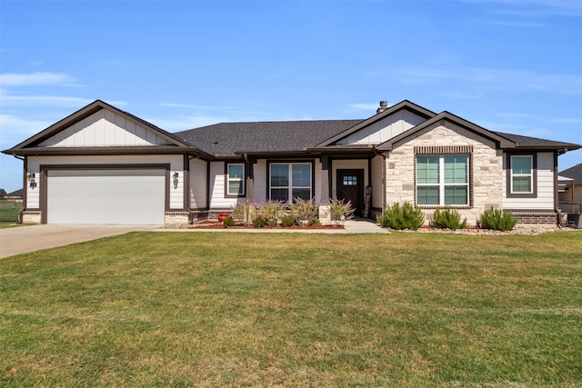 view of front of home with a garage and a front lawn