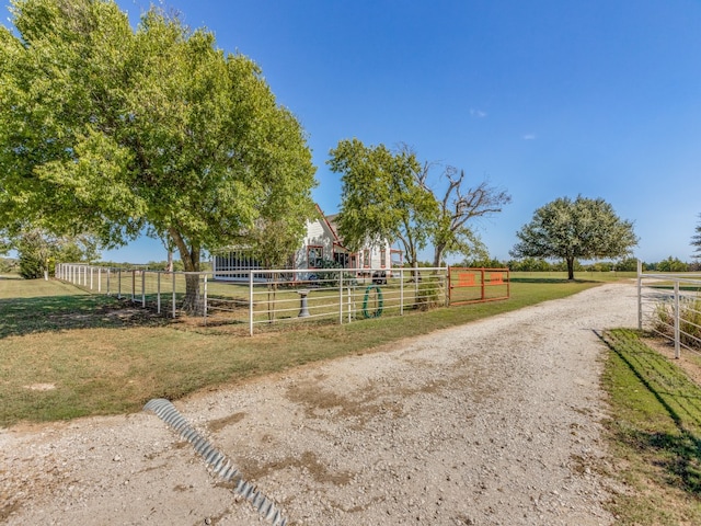 exterior space with a rural view