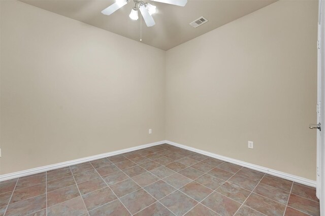 unfurnished bedroom featuring a closet, ceiling fan, and light tile patterned floors