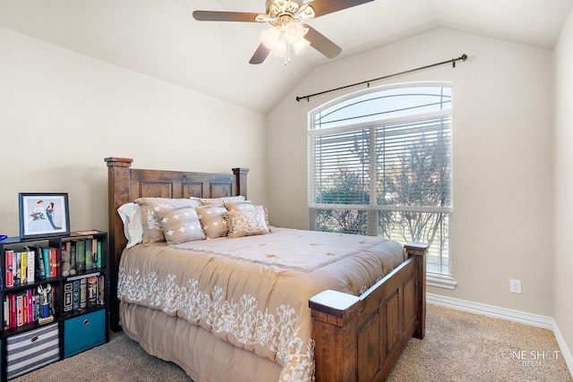 carpeted bedroom featuring ceiling fan and lofted ceiling