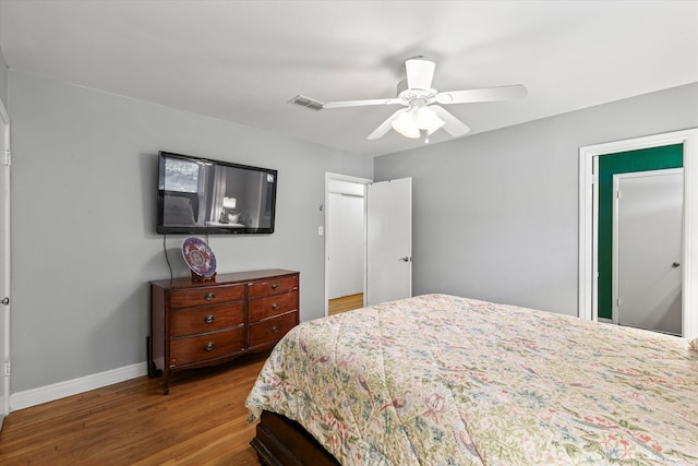 bedroom with ceiling fan and hardwood / wood-style flooring