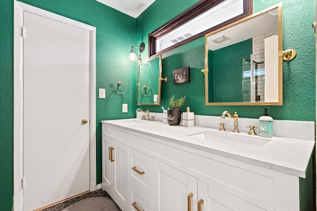 bathroom with vanity and tile patterned flooring